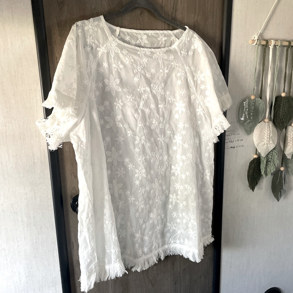 Embroidered top with fringe